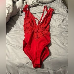 Women’s red bodysuit
